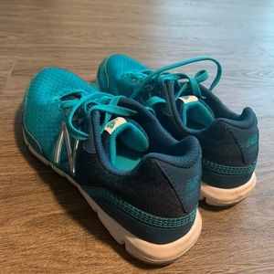 Teal New Balance runners